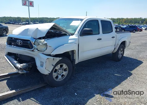 2014 Toyota Tacoma Base V6 z USA, uszkodzony, nr VIN 3TMLU4EN5EM149635